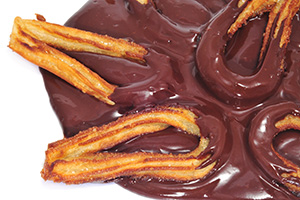 Preparación de churros de chocolate